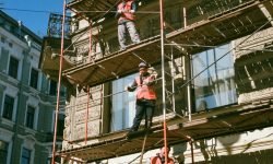 Men on Brown Scaffolding